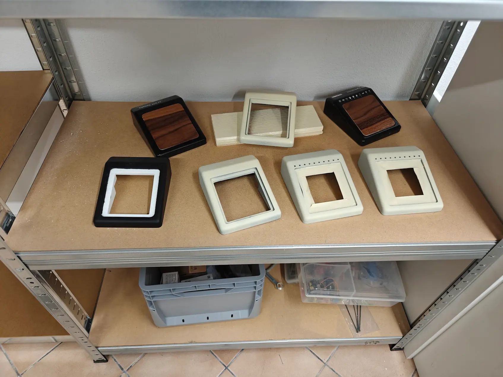 Before paint — bare metal enclosures lined up